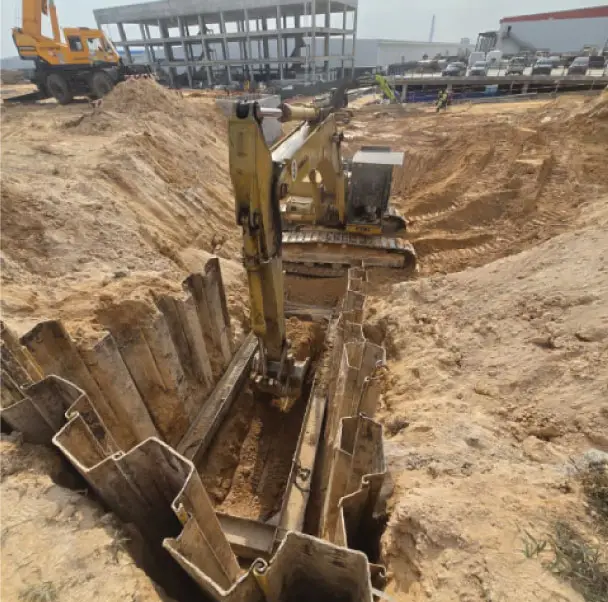 Water reticulation pipework being laid in an open trench at Bandar Serendah